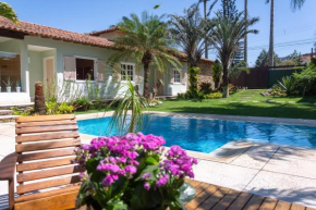 Área gourmet, piscina e garagem perto da praia